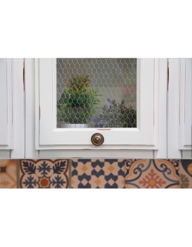 Blister con 4 pomos redondos para mueble...