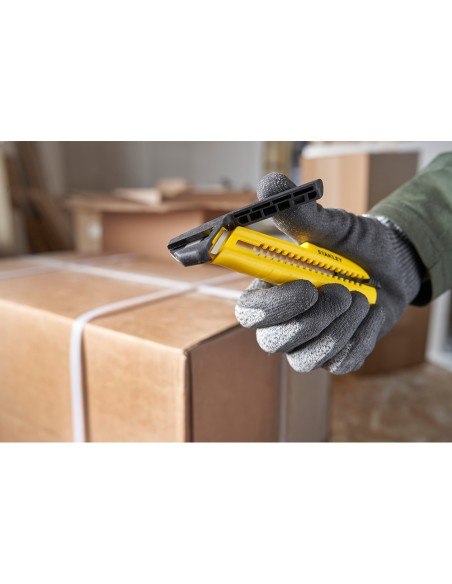 Cúter bi-material segmentación lateral con deslizador estándar 18 mm