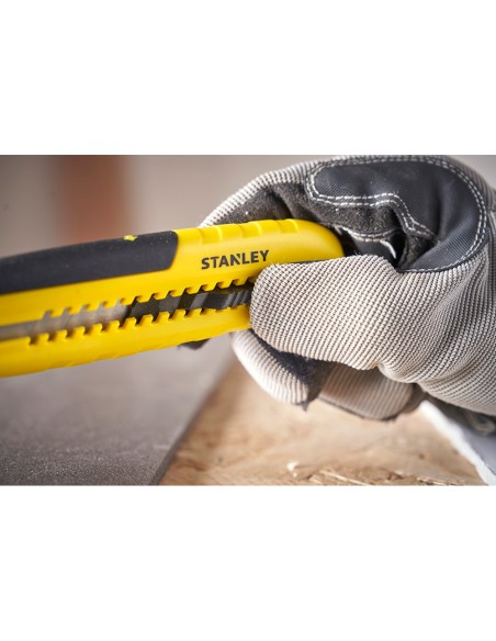 Cúter bi-material segmentación lateral con deslizador estándar 18 mm